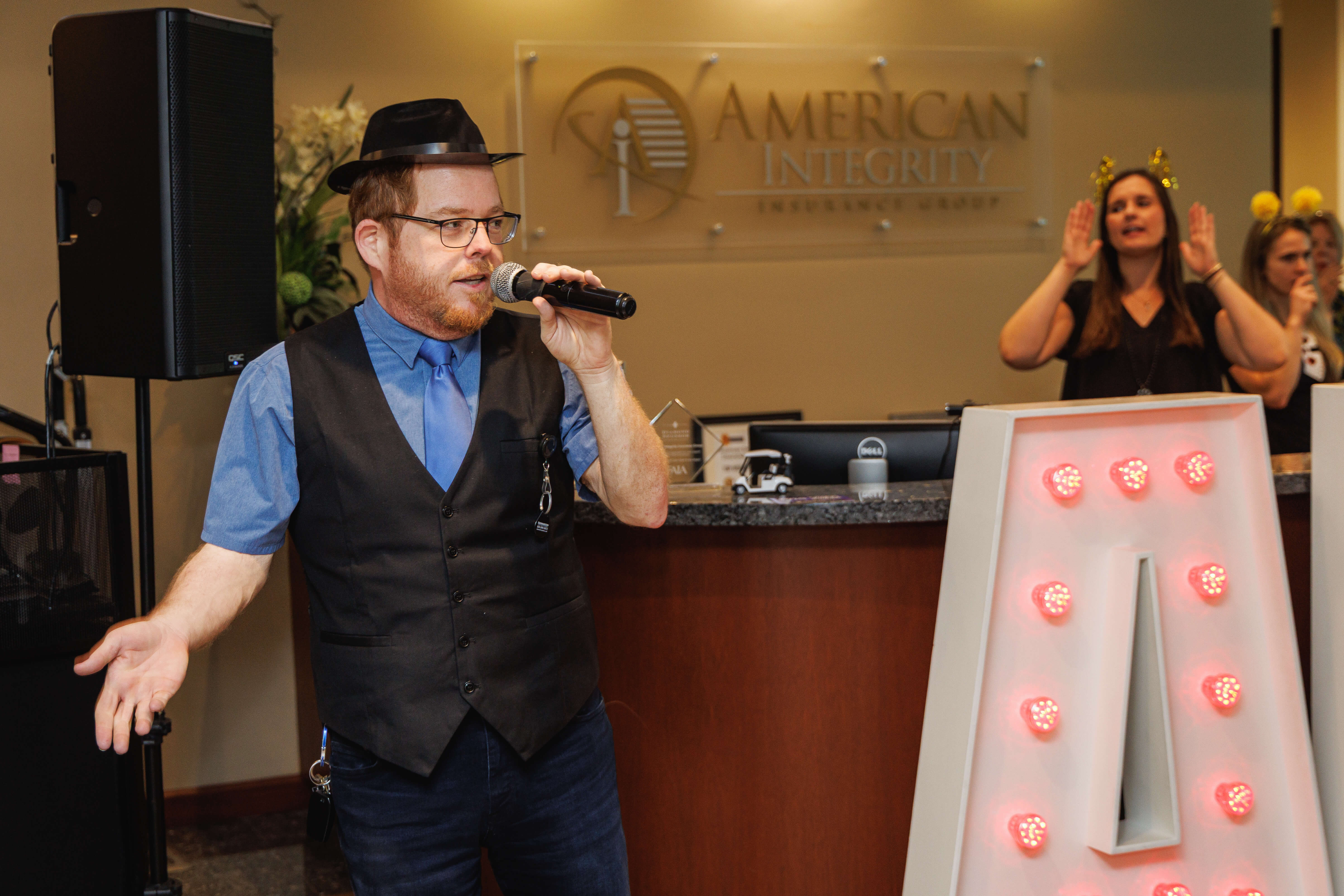 Jonathan Foster sings karaoke at our Winning Streaks celebration